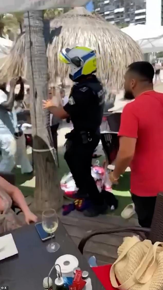 The scenes of chaos came amid one of many raids on illegal street vending in the Costa del Sol