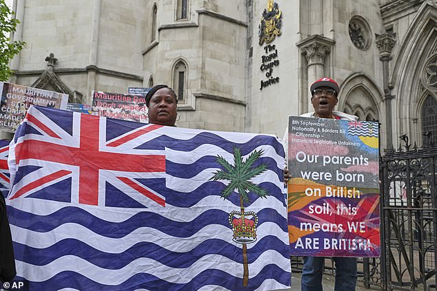 Pictured: British Chagossians demonstrating outside of the High Court in London where there was previously a bid to stop Parliament signing over the territory to Mauritius