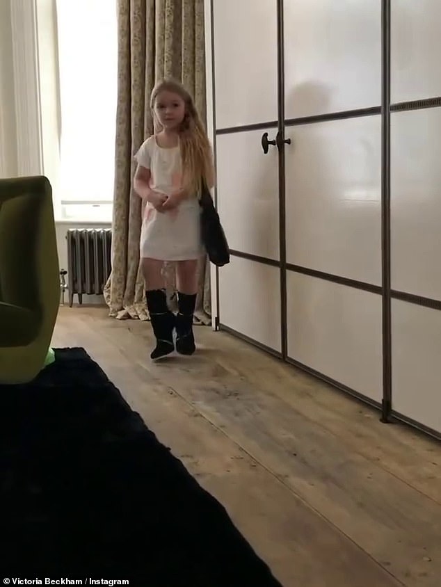 Another clip Victoria shared saw the youngster modelling a white dress and a pair of boots