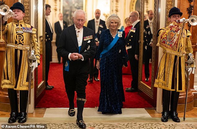 King Charles and Queen Camilla arrive at the Diplomatic Corps reception in November 2024, with Charles in traditional knee breeches and buckled shoes