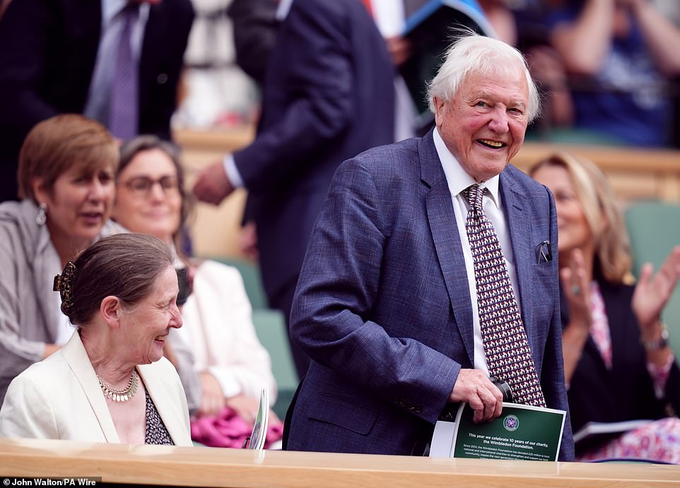 David Attenborough receives a standing ovation as he takes his seat in the Royal Box at Wimbledon, 2024