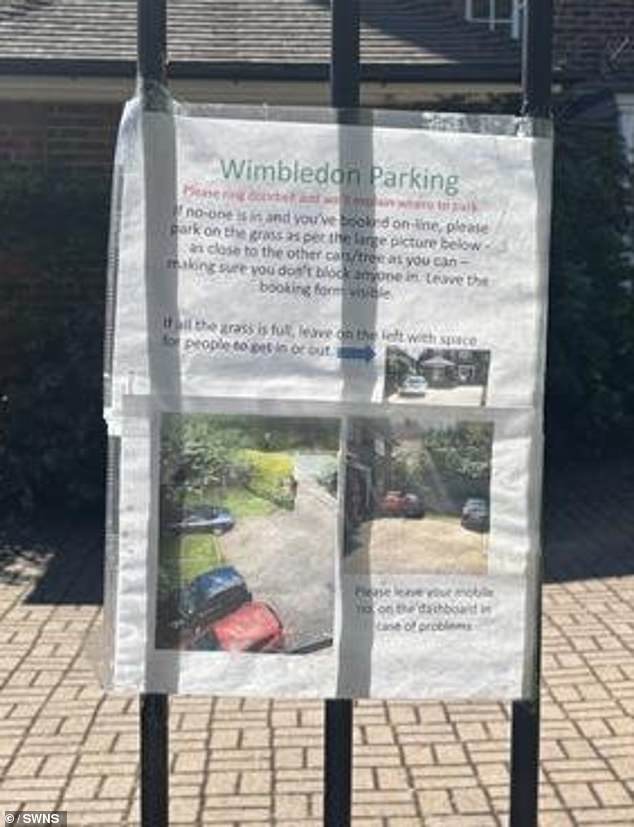 A sign displaying instructions to customers parking on a Wimbledon residents drive