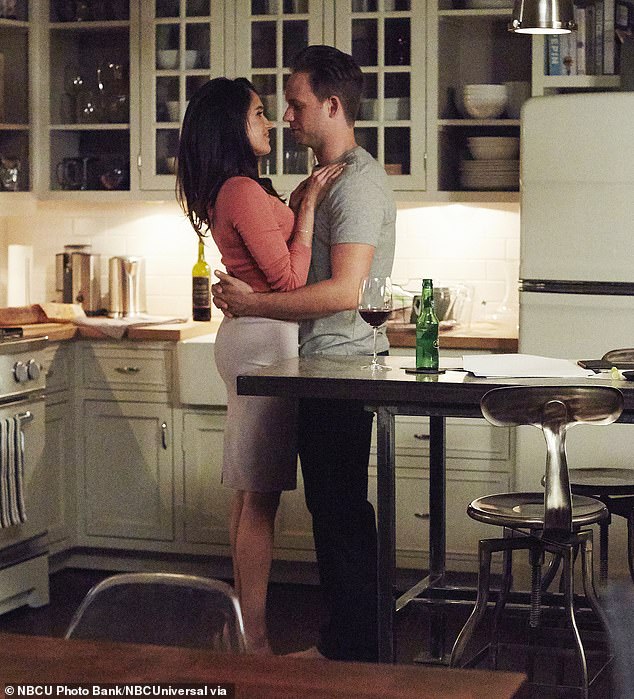 They continued: 'Mike was not in the bed next to her but sitting aside the bed. I'd say that's when I noticed for sure but I'm slow on the uptake!'. Pictured: Meghan with Patrick as Mike in series five of Suits in 2015