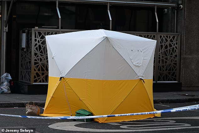The tent showing where the murder victim died, allegedly when a robber tried to snatch his gold watch and he fought back
