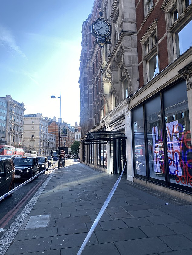 Police have cordoned off the pavement outside Harvey Nichols