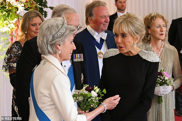 Britain's Birgitte, Duchess of Gloucester welcomes Brigitte Macron, wife of French President Emmanuel Macron, as she arrives for the Guildhall State Banquet during President Macron's state visit to the UK, in London, Britain, July 9, 2025