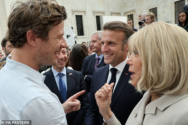 France's President Emmanuel Macron and his wife Brigitte Macron speak with English actor James Norton, during their visit to The British Museum, on the second day of a three-day state visit of French President to Britain, in London, Britain July 9, 2025