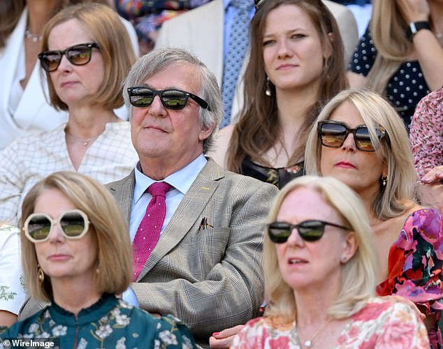 Former Australian Prime Minister Julia Gillard (bottom left) was pictured in the Royal Box at Wimbledon on Thursday afternoon in front of Sir Stephen Fry