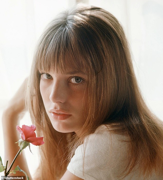 Jane only ever owned ¿ and subsequently sold ¿ five Birkins, all in plain black leather and personalised with stickers, worry beads, keys, luggage tags, bracelets and even a miniature harmonica dangling from its handles. Pictured in 1969