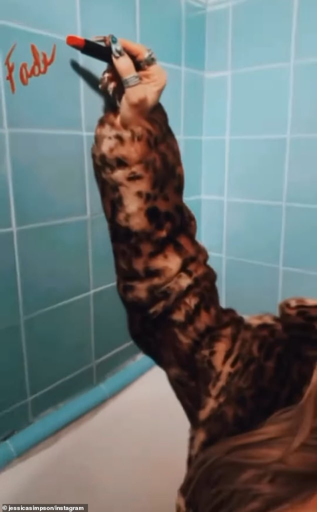 The I Wanna Love You Forever singer spent much of the video in a bathtub writing the name of the song on the tiled backsplash