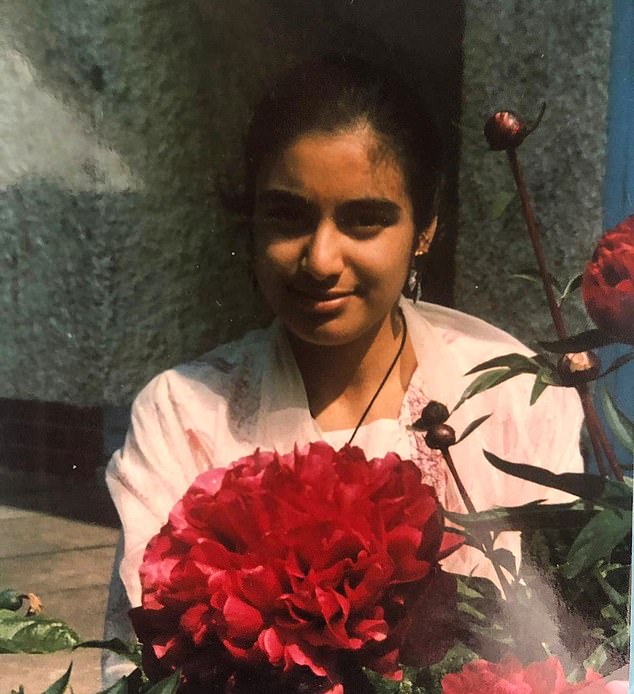 Nina says that following the assault, her father arranged to sell her to one of the alleged rapists as a sex slave, under the guise of marrying his son. Pictured: An image of Nina aged 14, taken to send to relatives in India for them to show to potential husbands