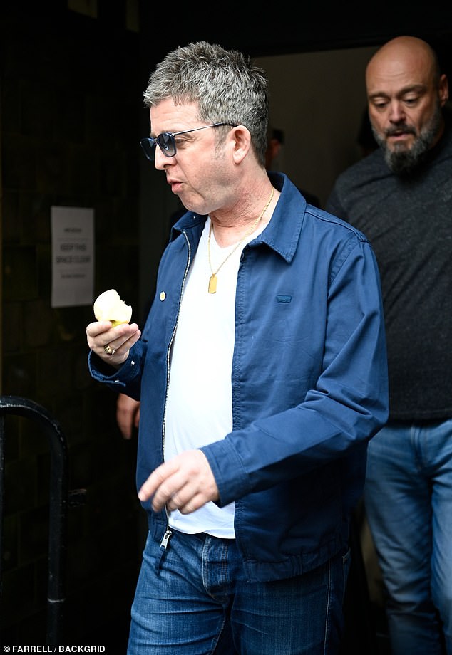 He sported a pair of jeans, a white T-shirt and a navy jacket as he strolled through the streets of Manchester while covering his eyes in a pair of sunglasses