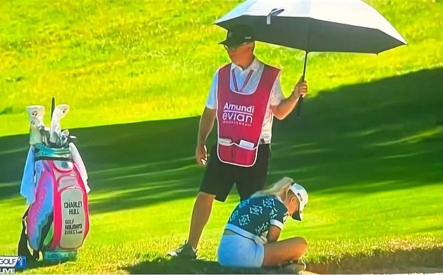 Hull collapsed twice by the fourth tee and was then seen sheltering under an umbrella