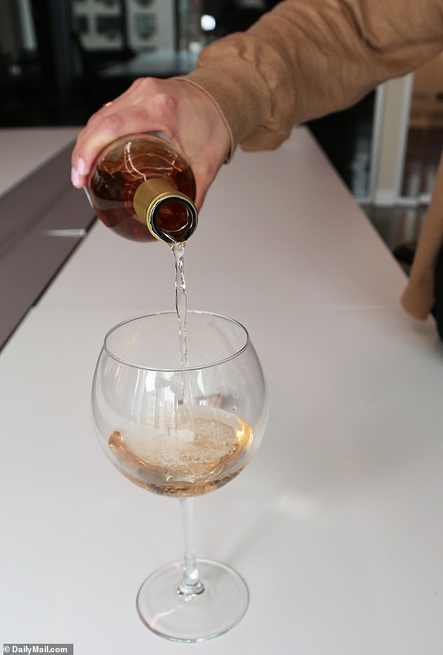 And, once we took a sip, it honestly didn't taste like much. It was smooth, but we couldn't easily detect the notes of stone fruit, that much is for sure