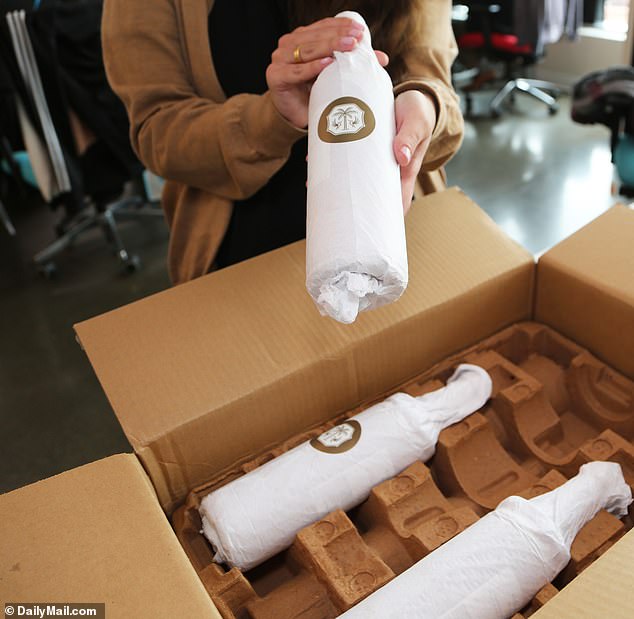 Upon opening the package, we discovered our three bottles of wine nestled in between two egg crate cartons that were shaped like bottles