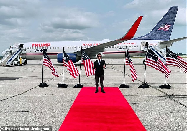 Fugate posing in front of Trump's campaign plane