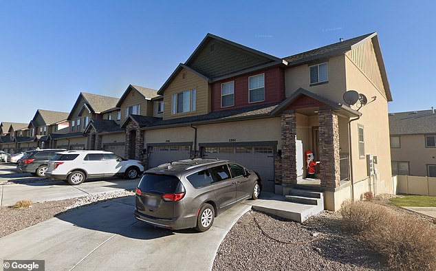 Lyman, 44, and her son Eli Painter, eight, were found with fatal gunshot wounds amid a gruesome scene inside their home (pictured) in Saratoga Springs, Utah on March 28