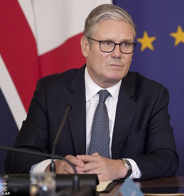 Keir Starmer attends attend a plenary at the UK-France Summit with French President Emmanuel Macron in Downing Street