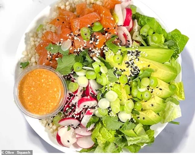 The Saucy Salmon Avocado bowl will set you back £14.30, without the cost of delivery and service fees if you're ordering directly to your office (pictured)