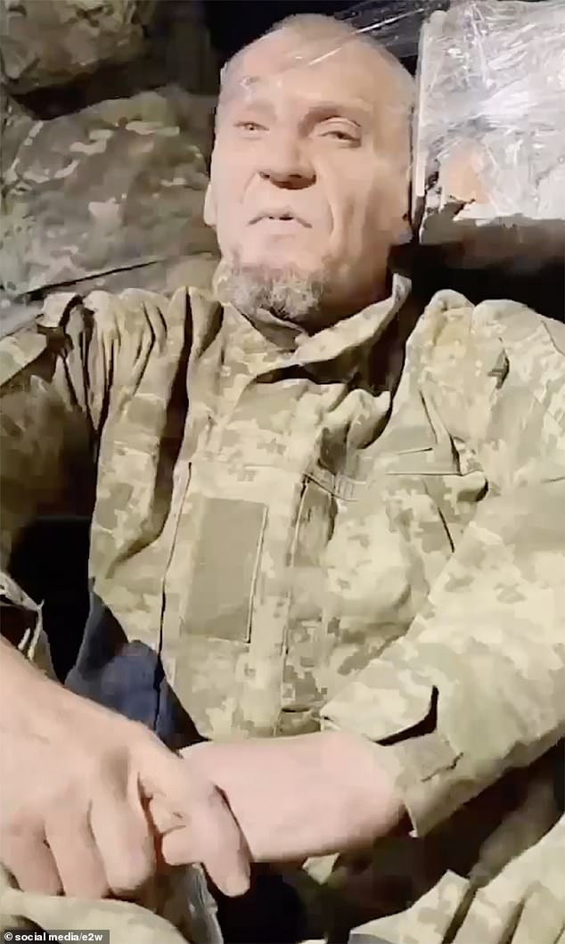 His murder echoes the execution of convicted murderer Yevgeny Nuzhin, 55, a Wagner mercenary who was also bludgeoned to death with a sledgehammer by the group (pictured moments before his death)