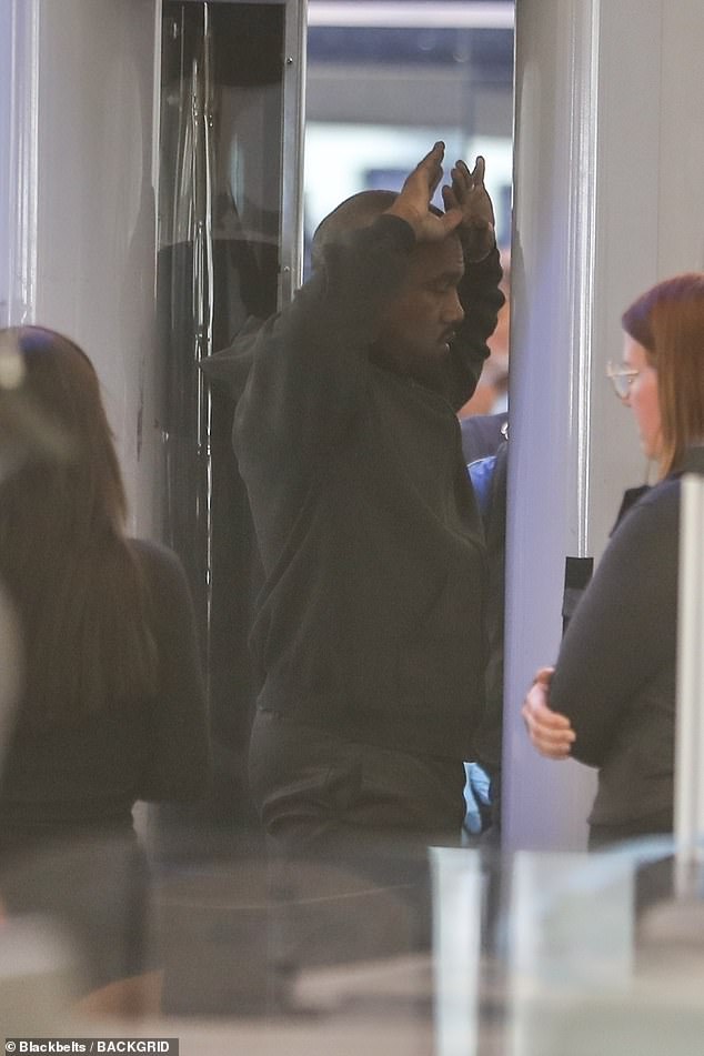 Inside, he was also spotted going through the walk-through metal detector