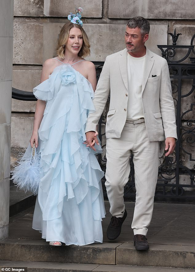 Katherine, who is expecting her fourth child with husband Bobby Kootstra, admitted she had to make her own fascinator after panicking the one she'd ordered wouldn't match her dress
