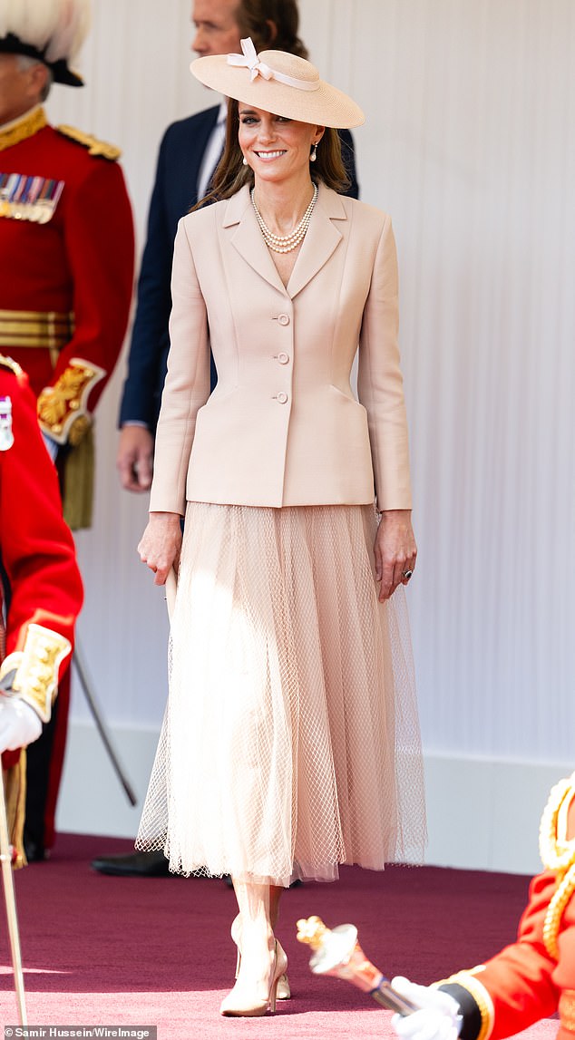 The metamorphosis from ordinary to outstanding reached a crescendo when Catherine wore a Dior ¿Bar¿ jacket and chiffon skirt to greet French President Emmanuel Macron this week
