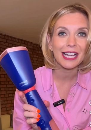 The star, pictured with a Philips¿ 5000 Series handheld steamer