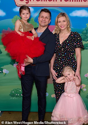 Rachel and her husband, dancer Pasha Kovalev, and their two children pictured in March