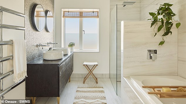 His striking beachside residence offers an enticing combination of contemporary luxury living and standout architectural features, including high ceilings