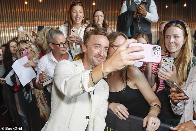 The actor, 37, he appeared in great spirits as he was seen posing for selfies with fans at the Theater am Großmarkt in the German city
