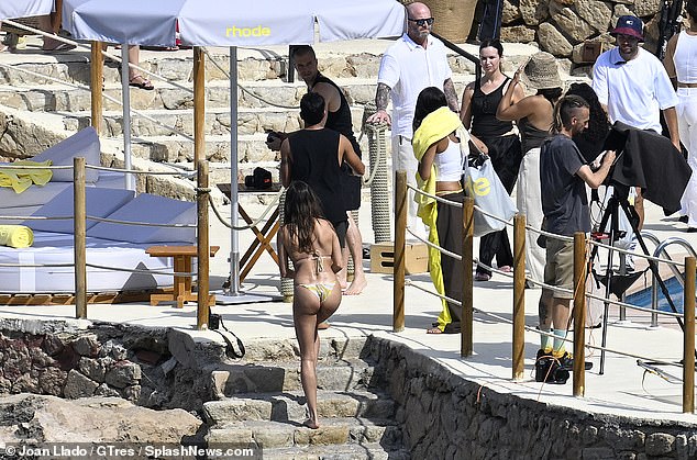 The crew also had Rhode umbrellas and yellow towels