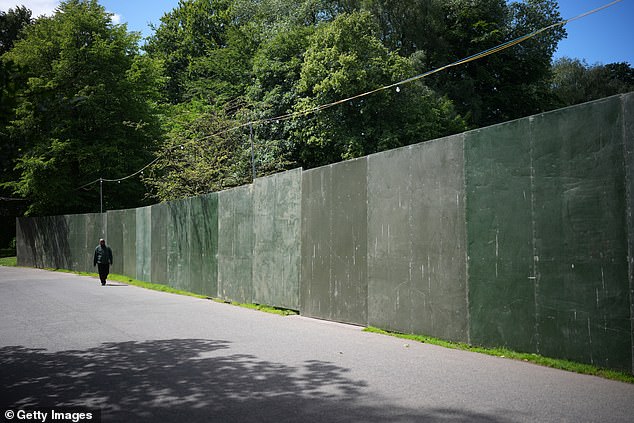 Heaton Park has been surrounded by a double security fence, with stewards patrolling along the middle of it
