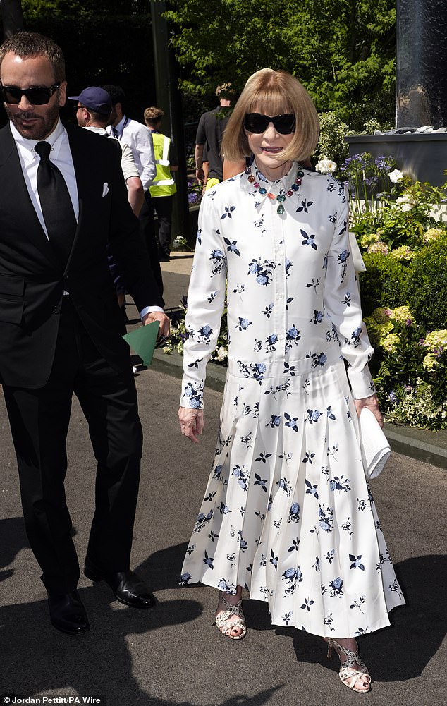 Anna Wintour joined the men as she wowed in an elegant white buttoned up dress adorned with blue flowers