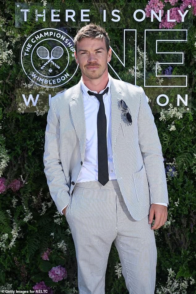 The actor opted for a white and light blue pinstripe summer suit which he paired with a white shirt and black tie