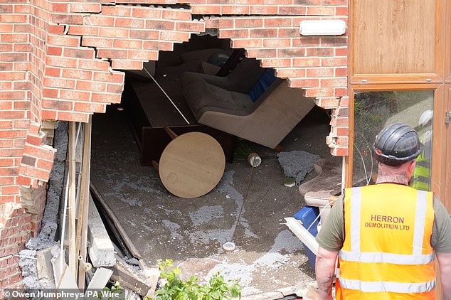 Photos show a massive hole in the building's brickwork that will now need to be filled in