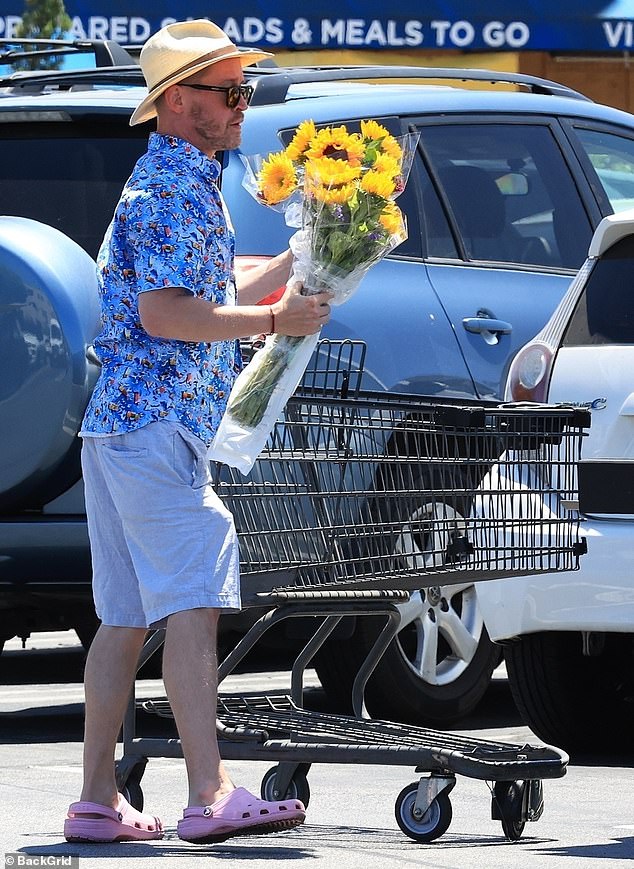 Culkin kept it casual for the daytime excursion in a patterned blue shirt as well as light gray shorts