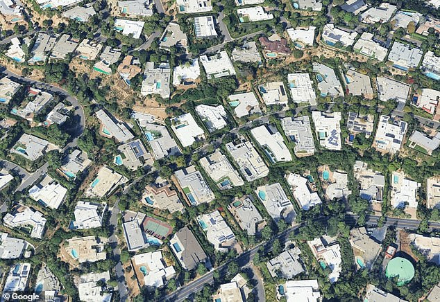 The jaw-dropping six-bedroom, seven-bathroom property, which was bought in cash in December - sits in the celeb-packed Beverly Hills (general view)
