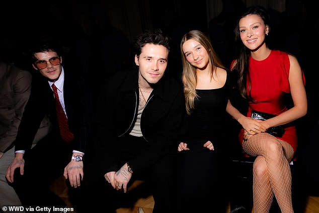 Cruz Beckham, Brooklyn Beckham, Harper Beckham and Nicola Peltz Beckham at Victoria Beckham's Ready to Wear Autumn 2024 show in Paris