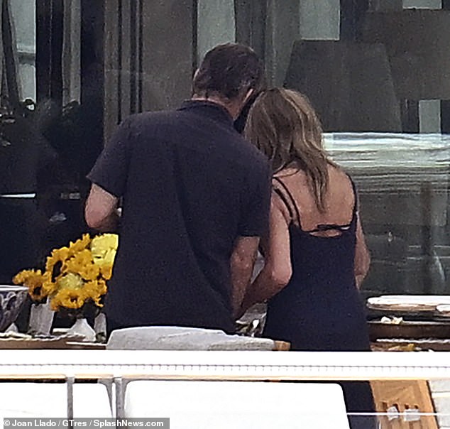 The new couple were seen leaning into one another at sea