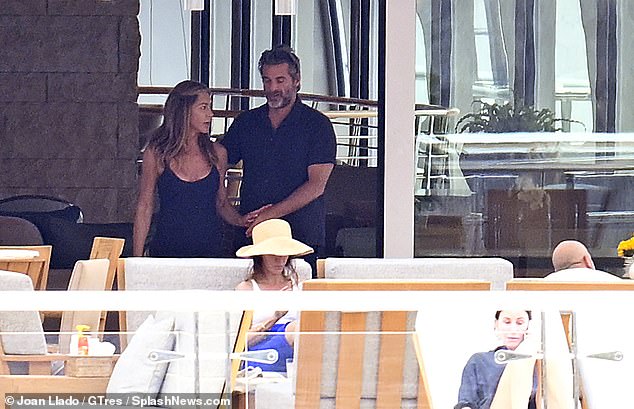 The pair were hanging out with Aniston's Friends BFF Courteney Cox (right)