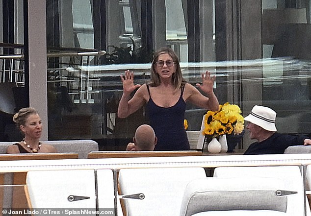 The star looked animated as she chatted with her friends