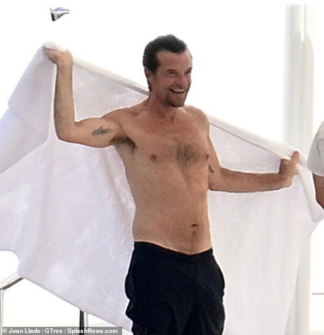 Jason Bateman showed off his muscles during the day