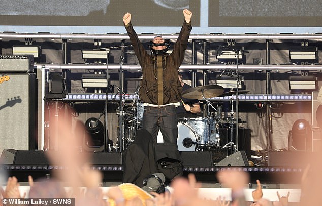 Oasis opened their set with Hello from their 1995 second album (What's the Story) Morning Glory?, before playing Acquiesce