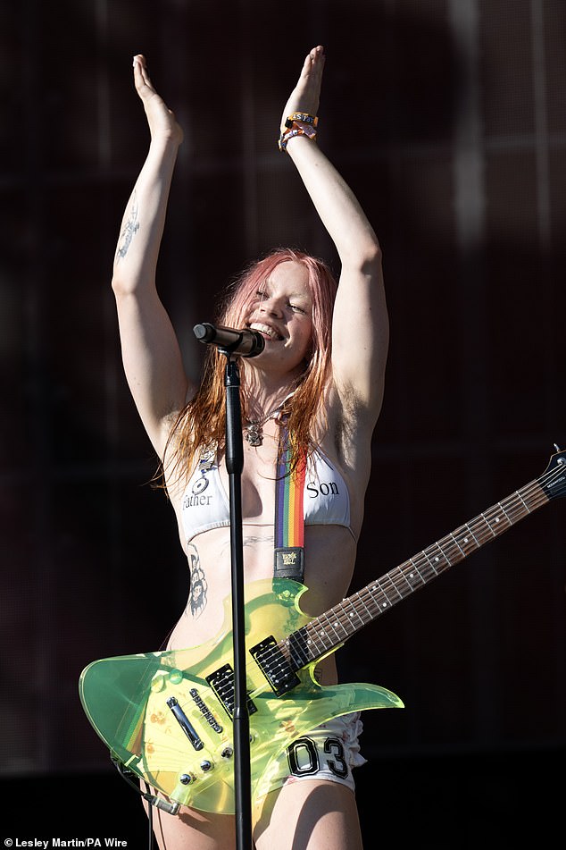 The 33-year-old seemed in high spirits for the performance as she was pictured geeing the crowd up