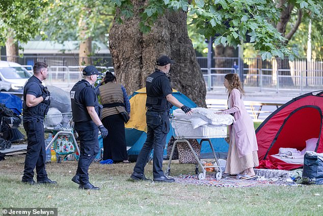 Migrants evicted today from their camp in Park Lane London by balifs holding a High Court warrant