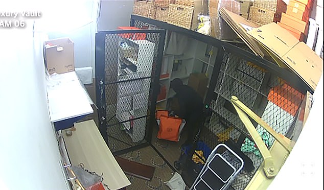 Just four minutes after the raid began at 3.20am on February 9, the thieves left with a haul worth well over a million pounds. They are seen here returning to the property to steal another £500,000 worth of Hermes handbags