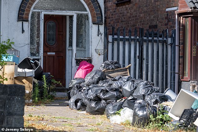 Huge piles of rubbish has gathered at the end of street corners after bin men have been on strike for the last four months