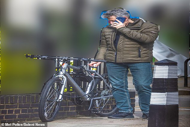 Howard Philips allegedly following his handlers' instructions by dropping off the USB stick