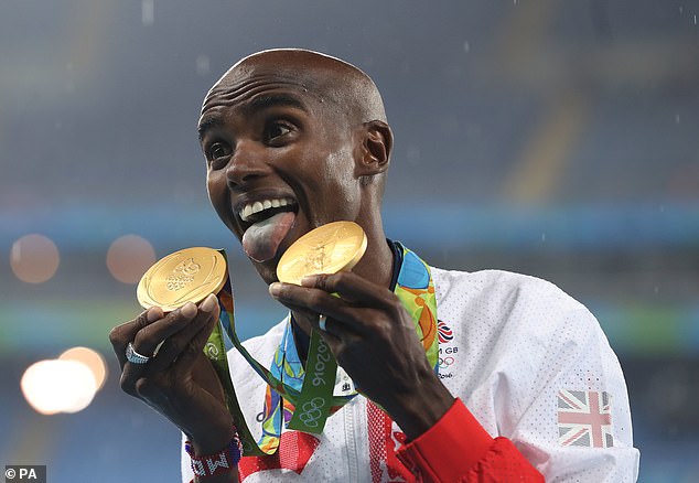 Mo Farah celebrates with his gold medals after winning the Men's 5000m and 10,000m at the Olympic Games in Rio